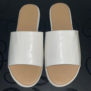 Forever21 White Slides. Women’s US Size 7, EU Size 38.